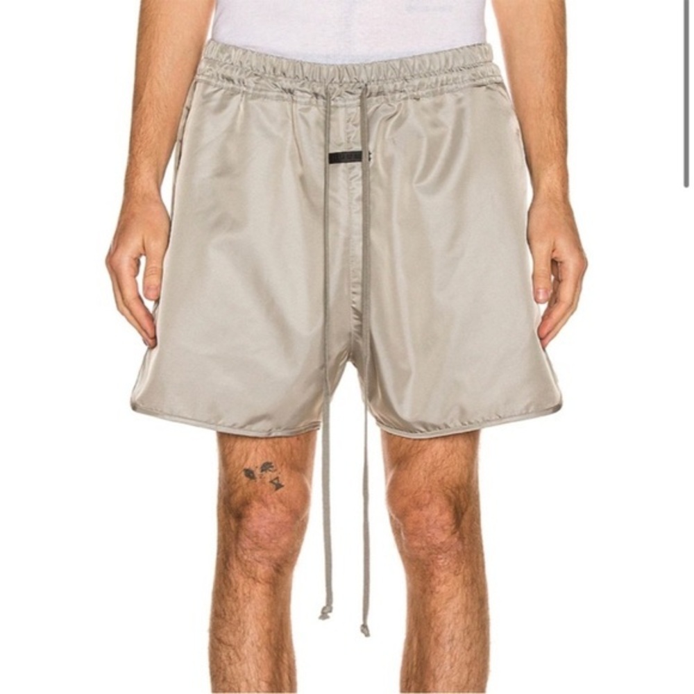 FEAR OF GOD ESSENTIALS Nylon Track Shorts in Silver
